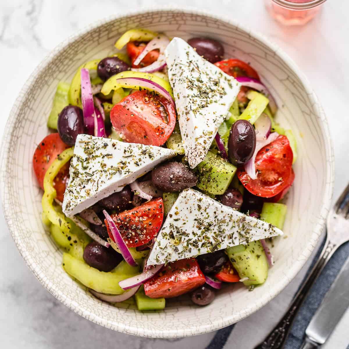 greek salad in white bowl