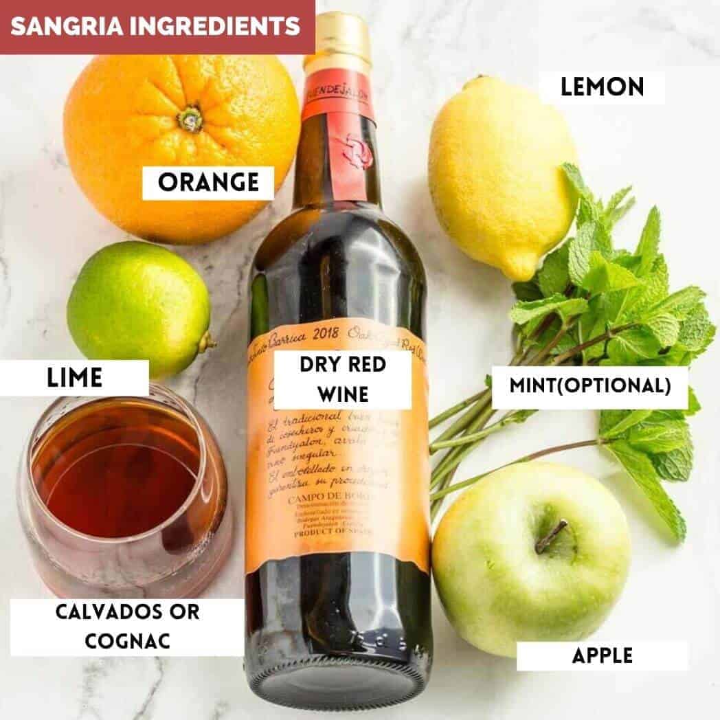 Ingredients needed to make sangria on marble background