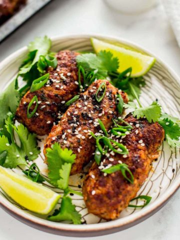 Thai spiced beef koftas with sesame, spring onion, soy and lime