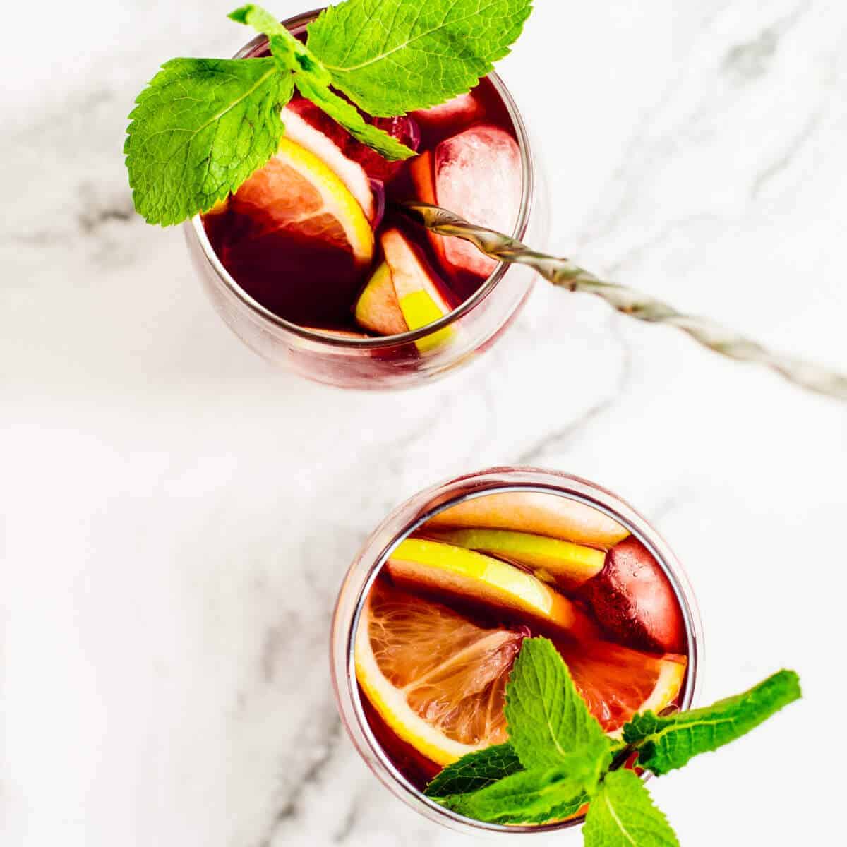 sangria in glasses on marble viewed from the top