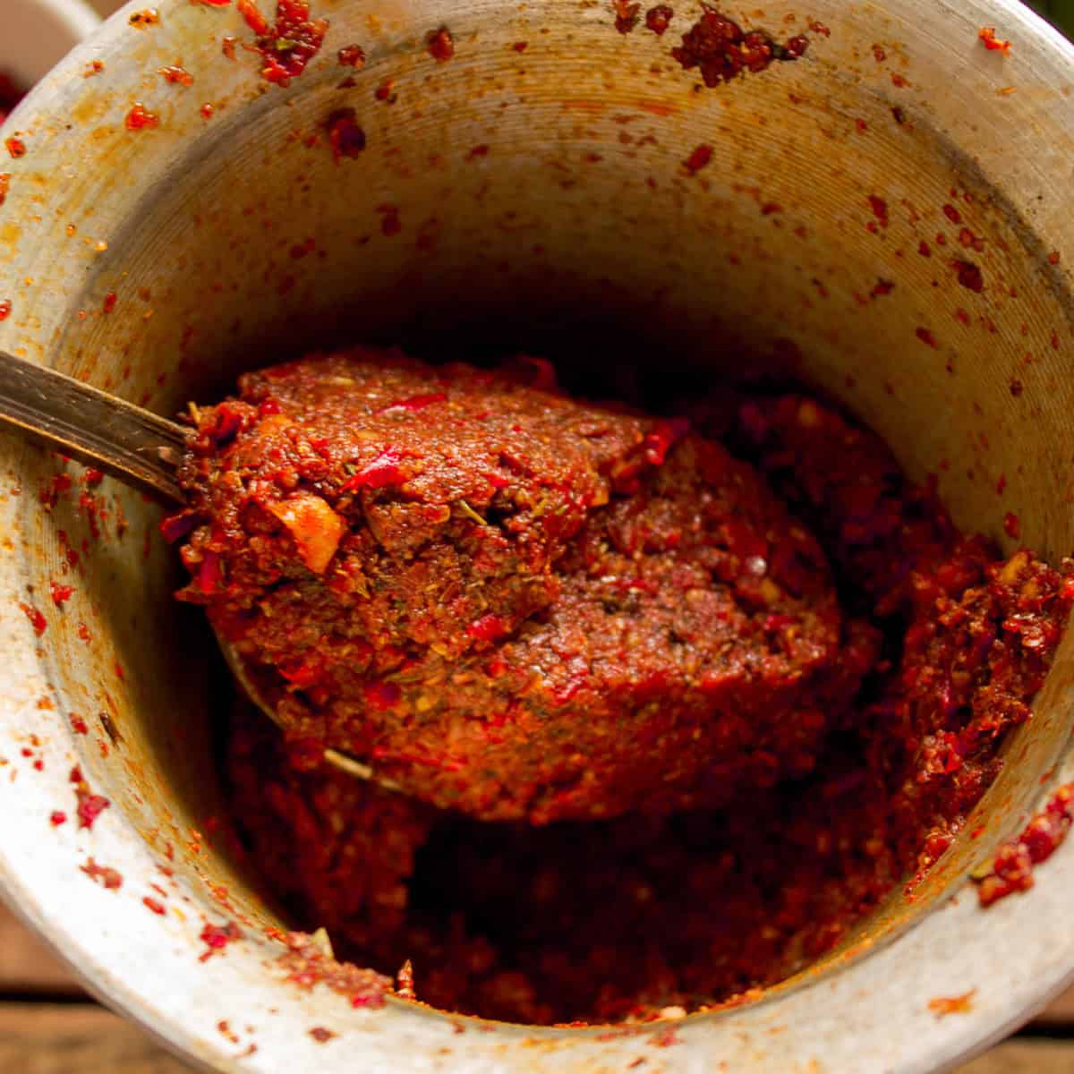 Adjika paste in pestle and mortar.