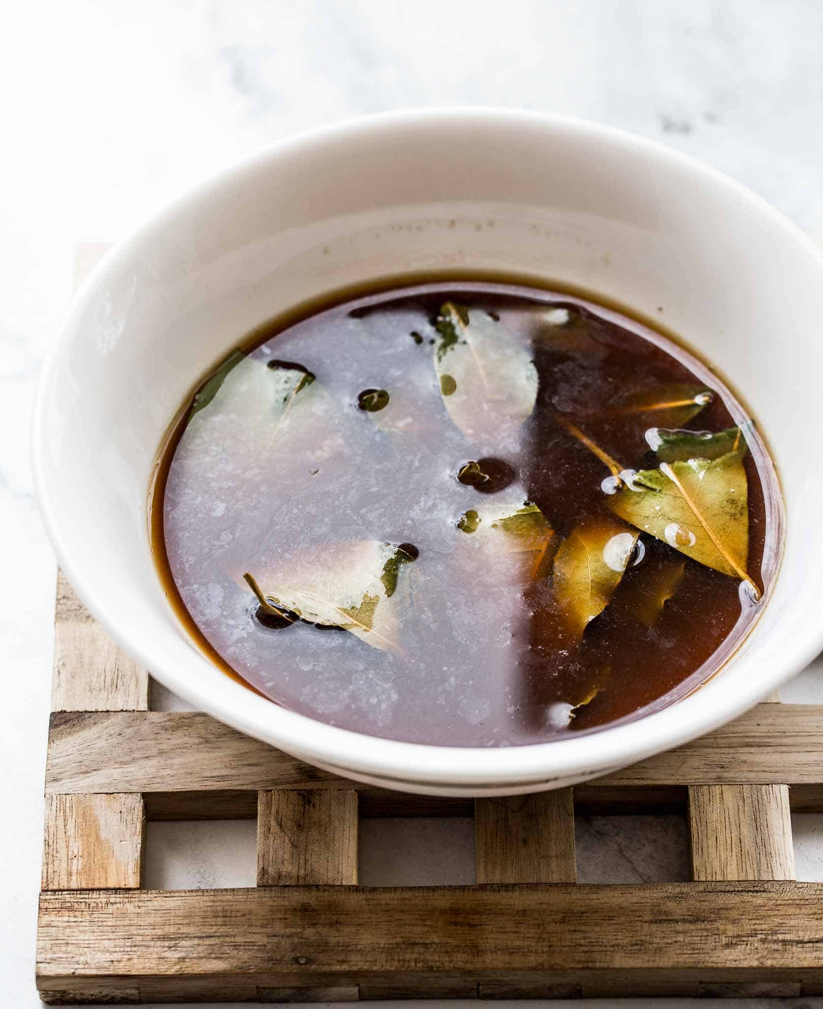 Adobo marinade in white bowl