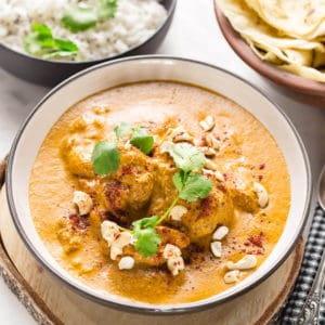 butter chicken in a white bowl