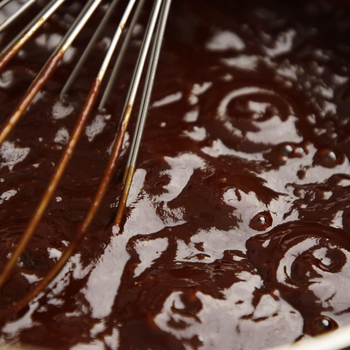 Barbecue glaze in a sauce pan.