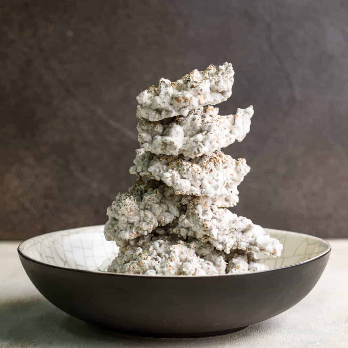 Stack of barley koji in raku bowl.