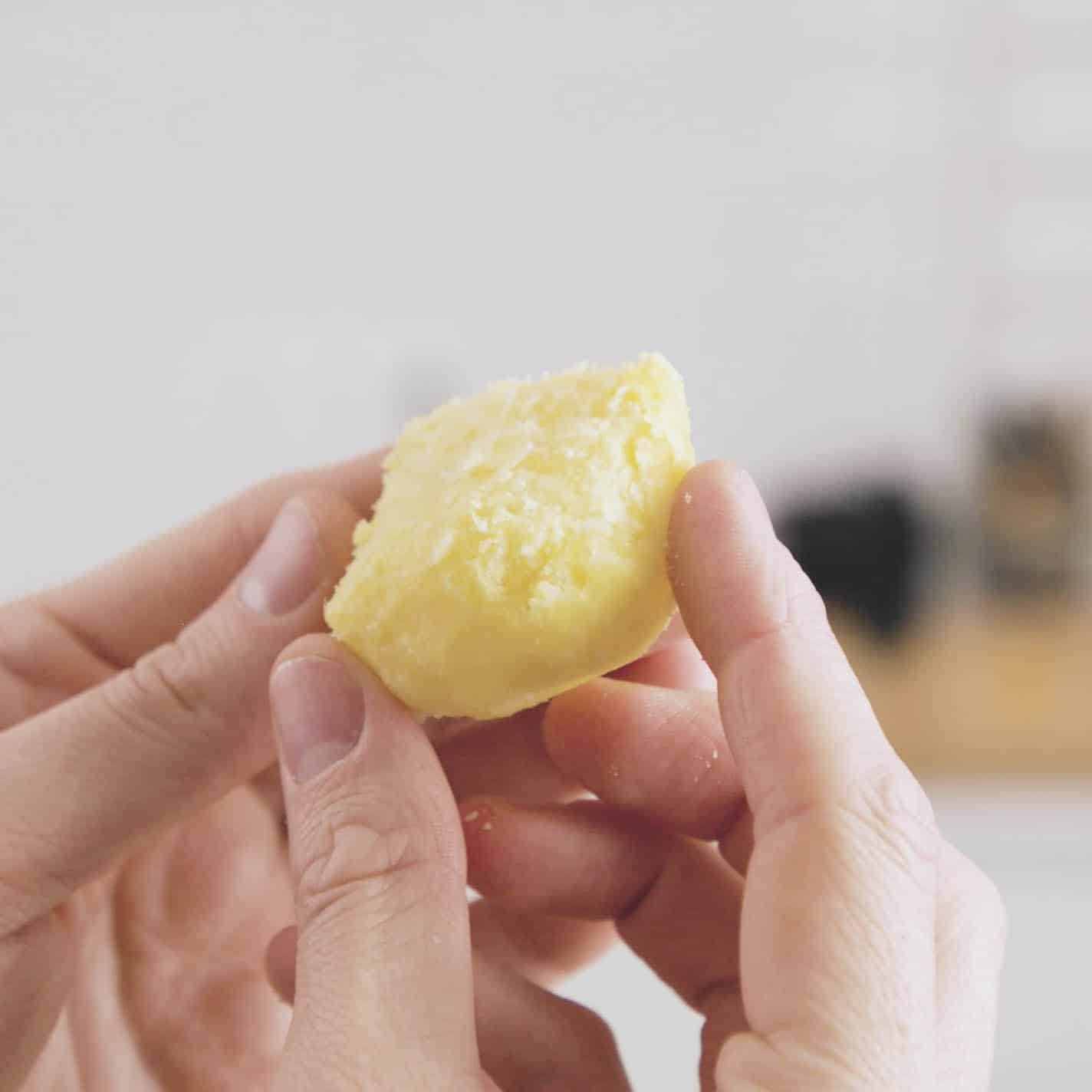 Fluffed up boiled potato with rough edges.
