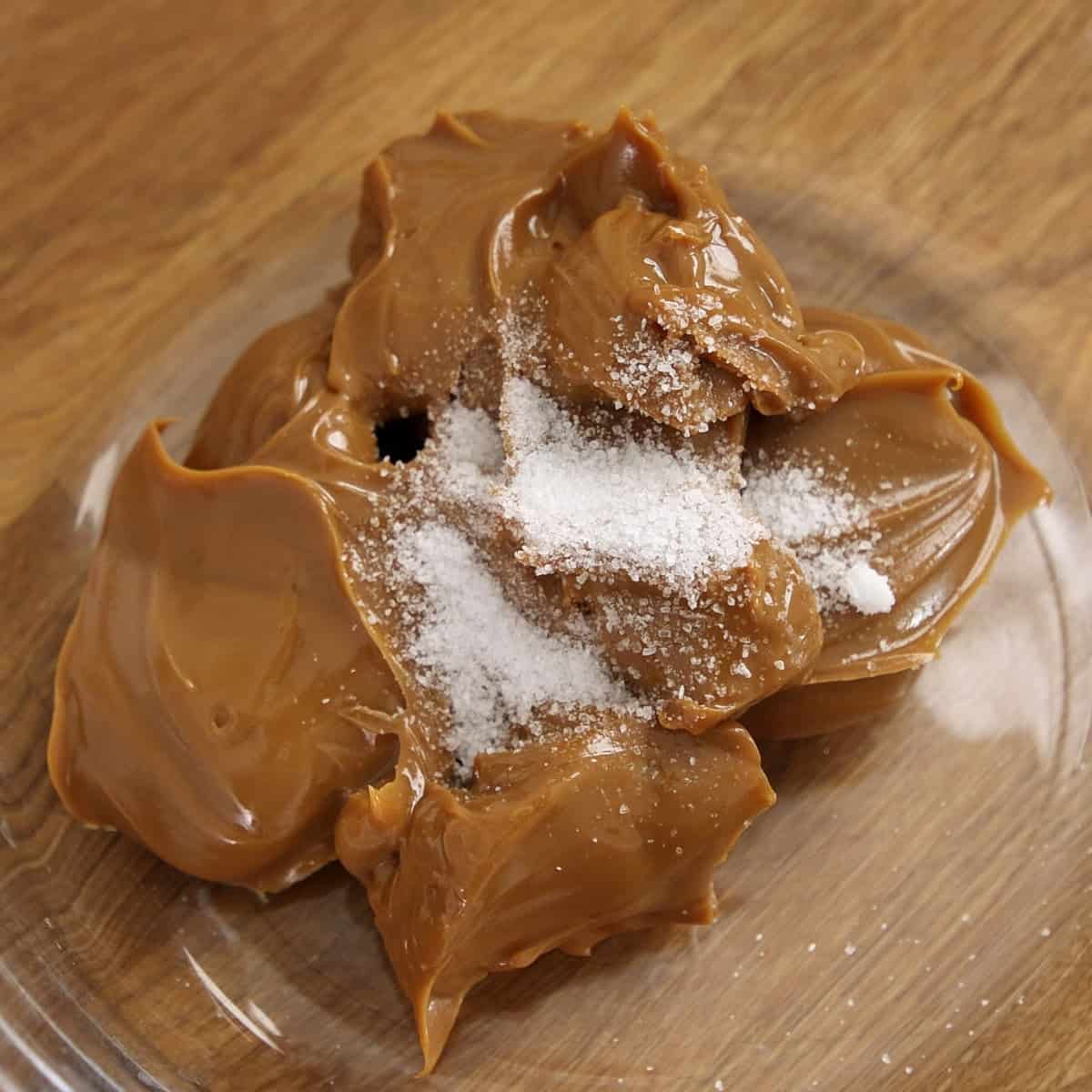 Caramel treat with salt in a bowl.