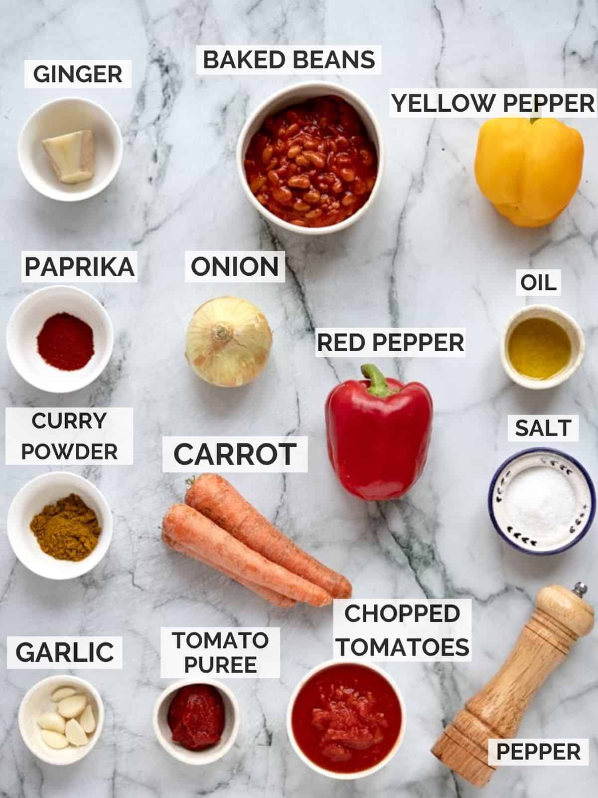 Chakalaka ingredients on a marbled board.