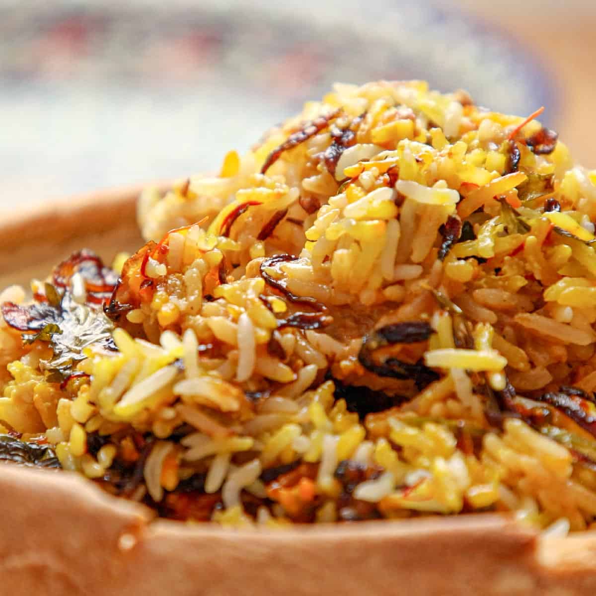 Biryani served in bowl.