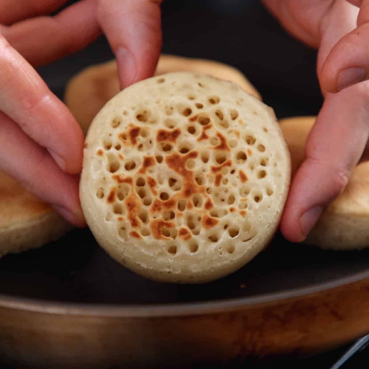 Browned top of crumpet.