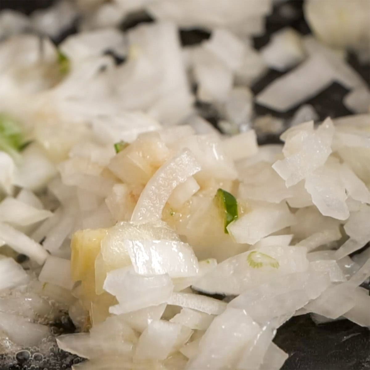 Onion, garlic and ginger cooking for curry base.