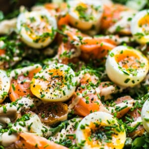 cured salmon salad in a brown bowl.