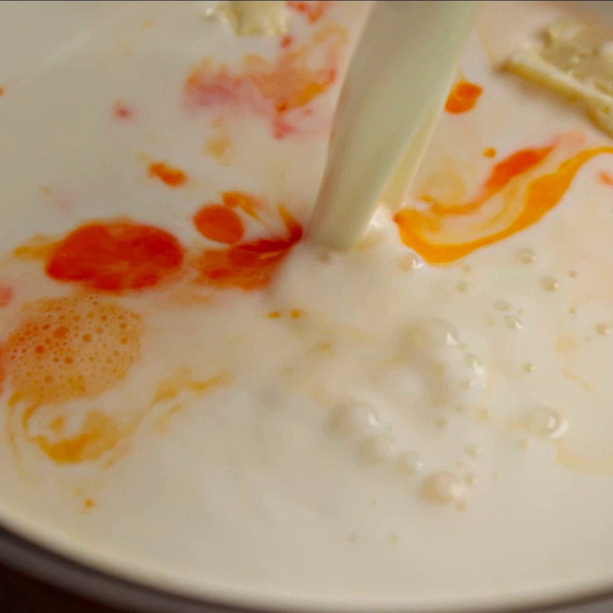 Custard mix in a pot.