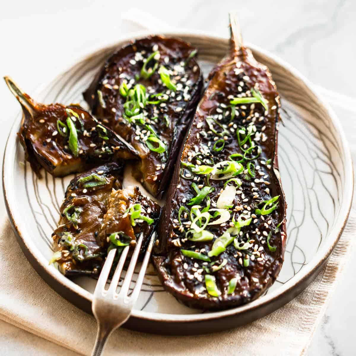 den miso eggplant on white plate.