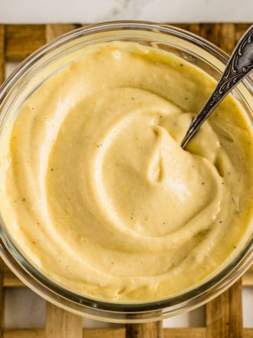 homemade mayonnaise in glass jar.