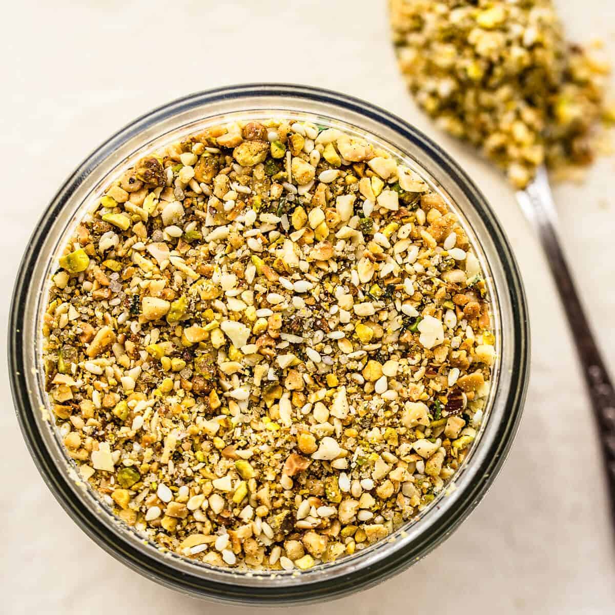 Dukkah in a glass jar.