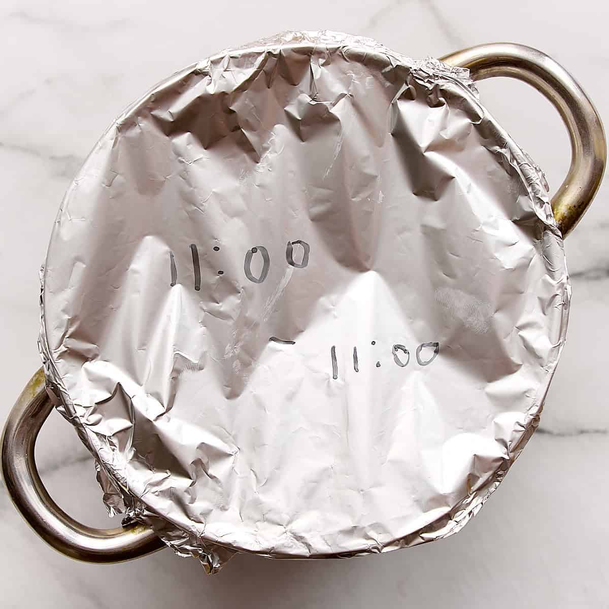 Pot covered with alumimum foil.