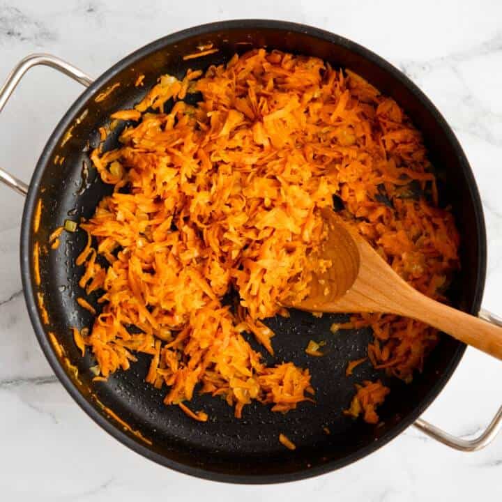 Carrots cooking in a pan.
