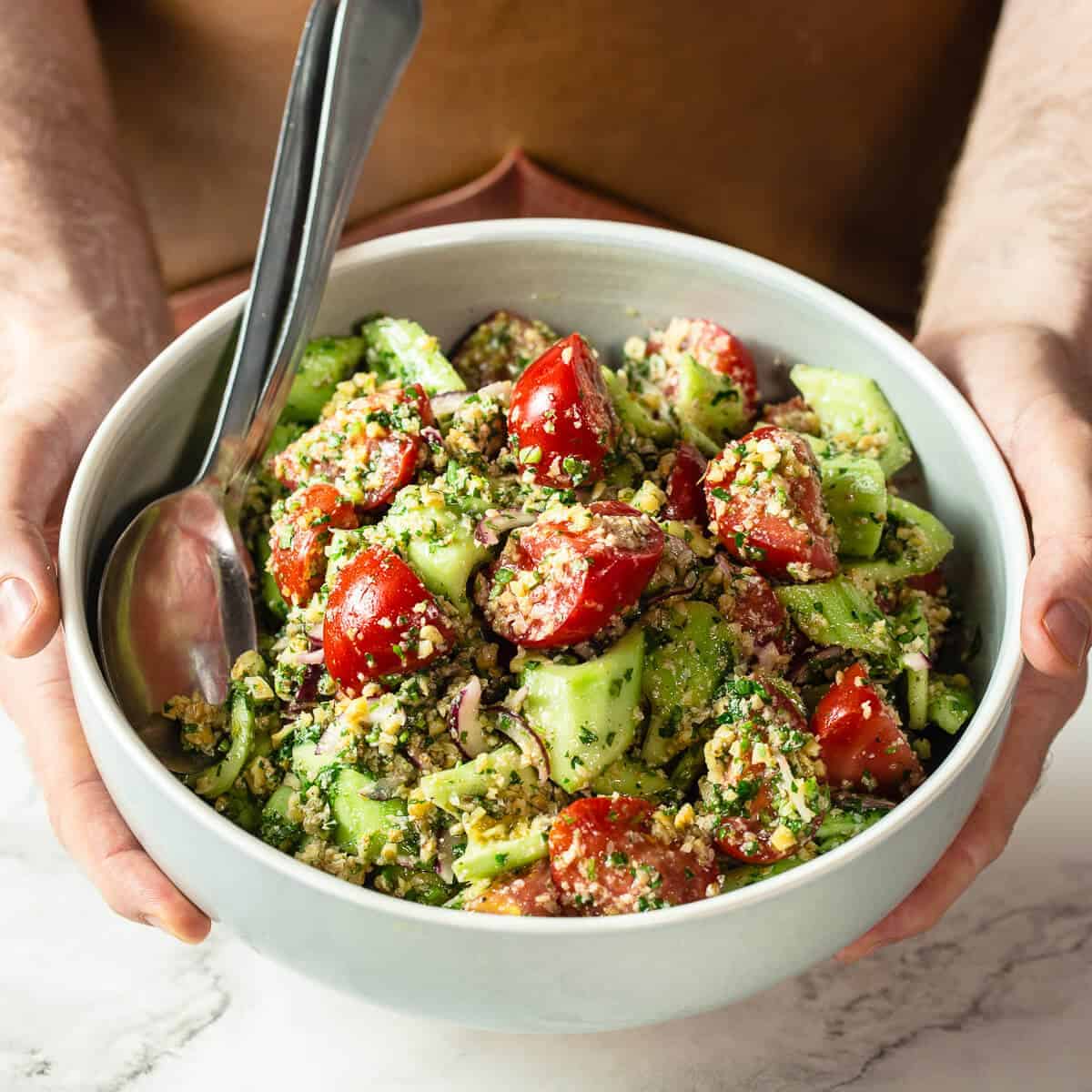 georgian salad in green bowl.