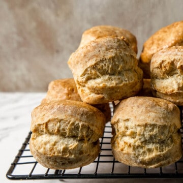 baked british scones on a black wire rack