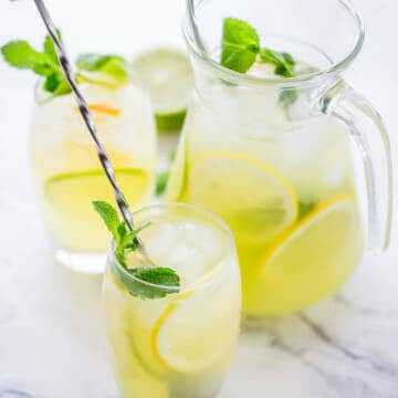 lemonade in glasses and large jug.