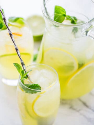 lemonade in glasses and large jug.