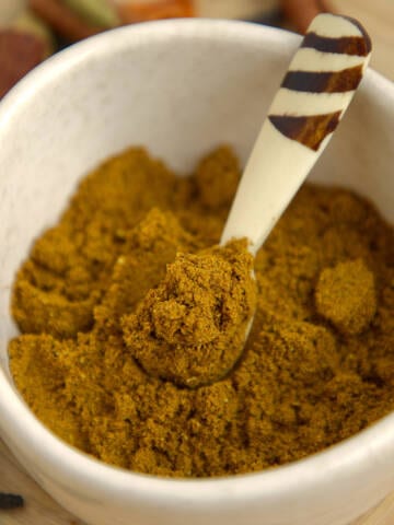 Spice blend in a white bowl.