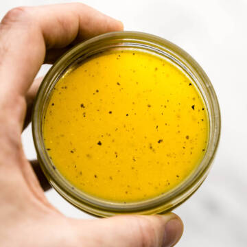 yellow honey dressing in glass jar