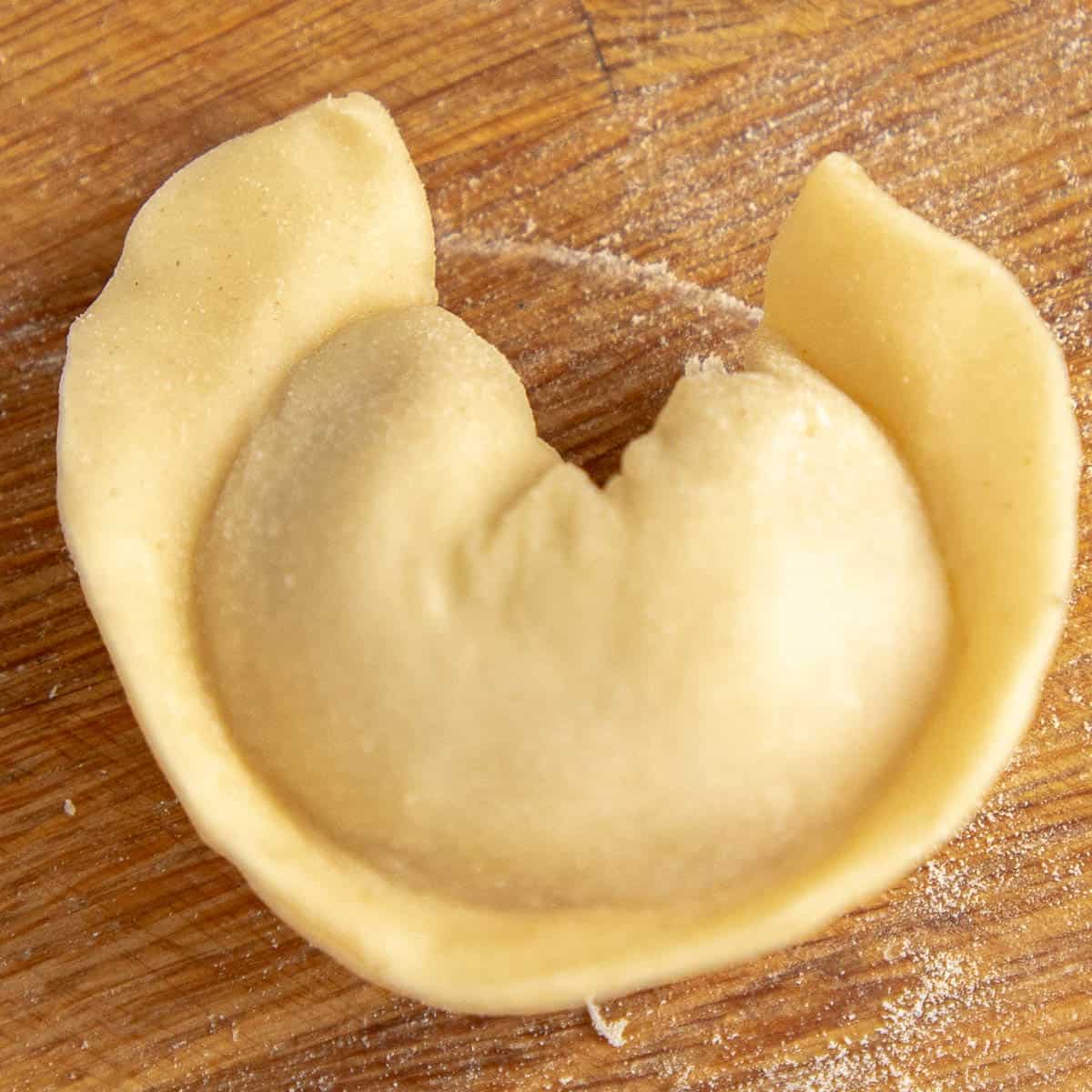 Shaping pelmeni.