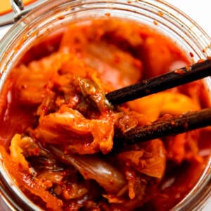 Kimchi in a glass vessel.