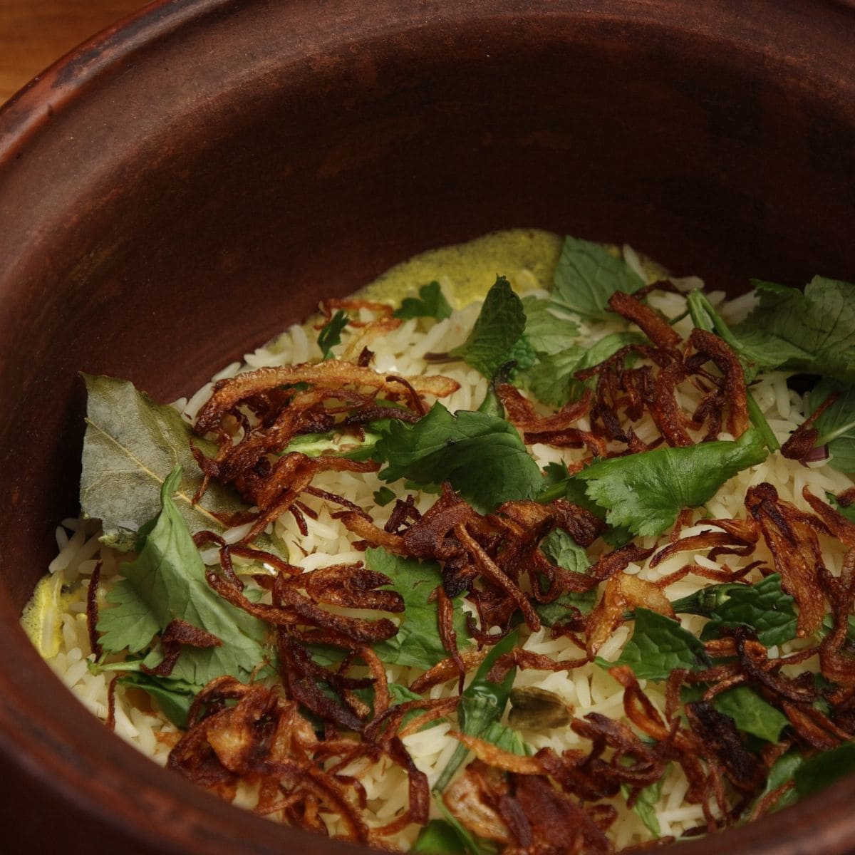 First layer of biryani rice.