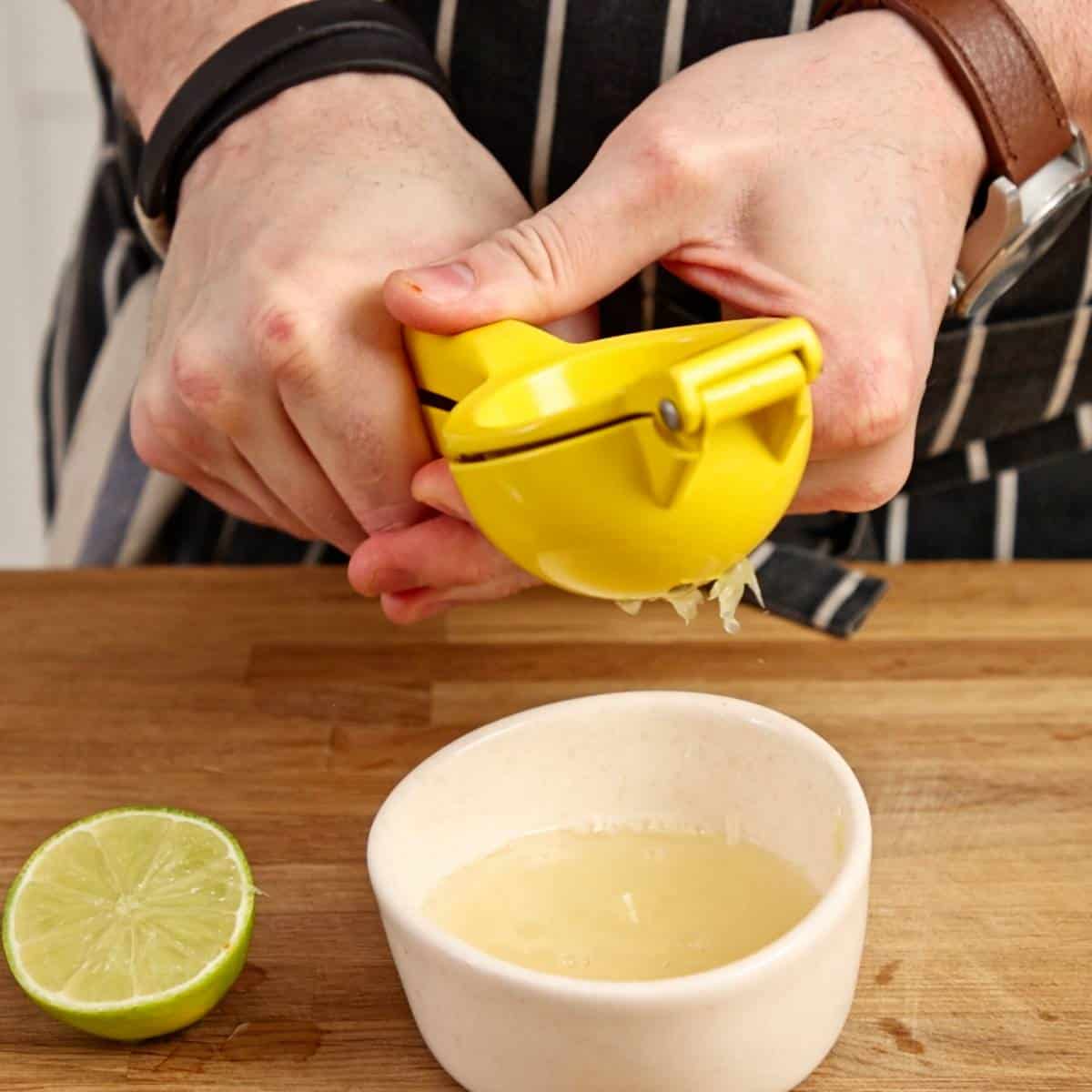 Squeezing lime juice for dipping sauce.