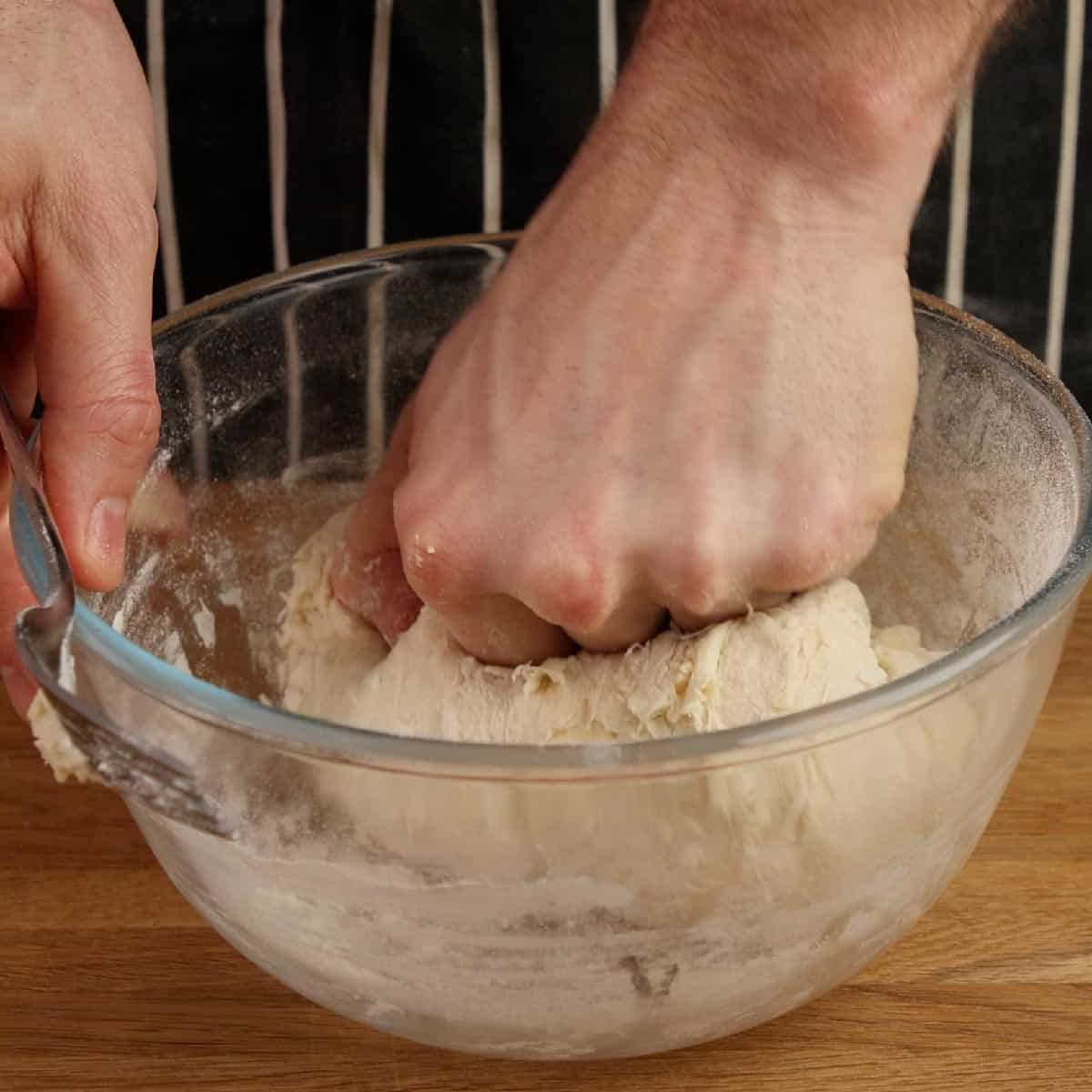 Kneading dough for flatbread.