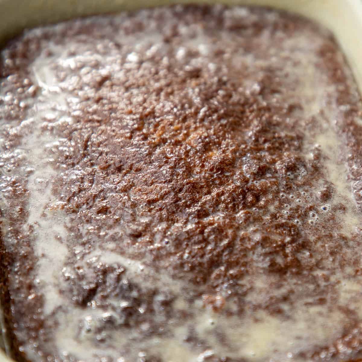 Sauce soaking into cake.