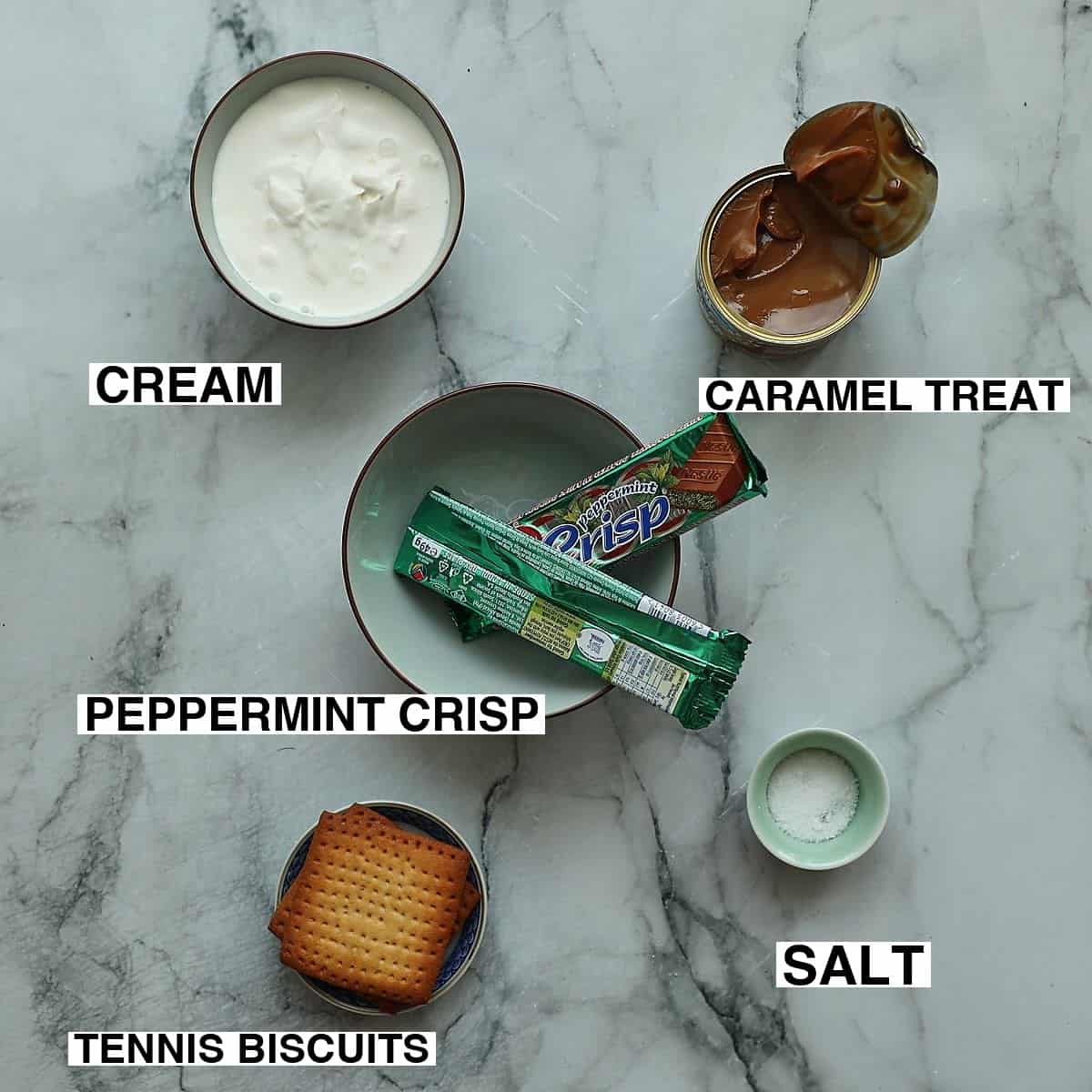 Ingredients for making peppermint crips on a marble surface.