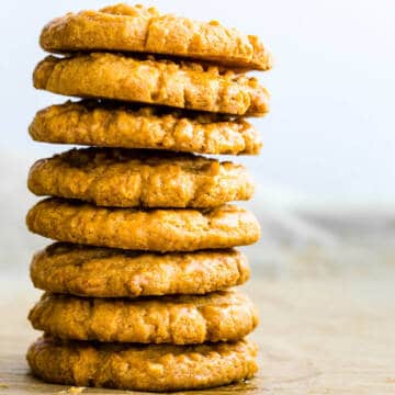 parmesan sablé cookies stacked on top of each other.