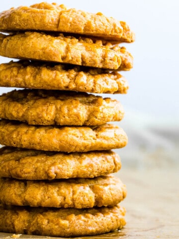 parmesan sablé cookies stacked on top of each other.