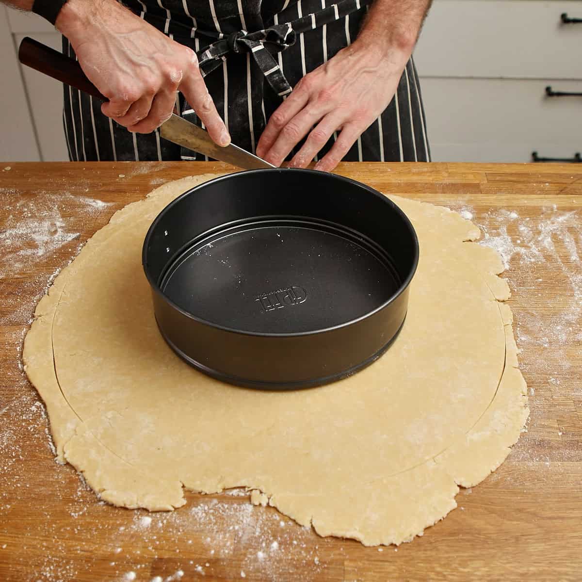 Springform base set on rolled pastry to size the base and lid.