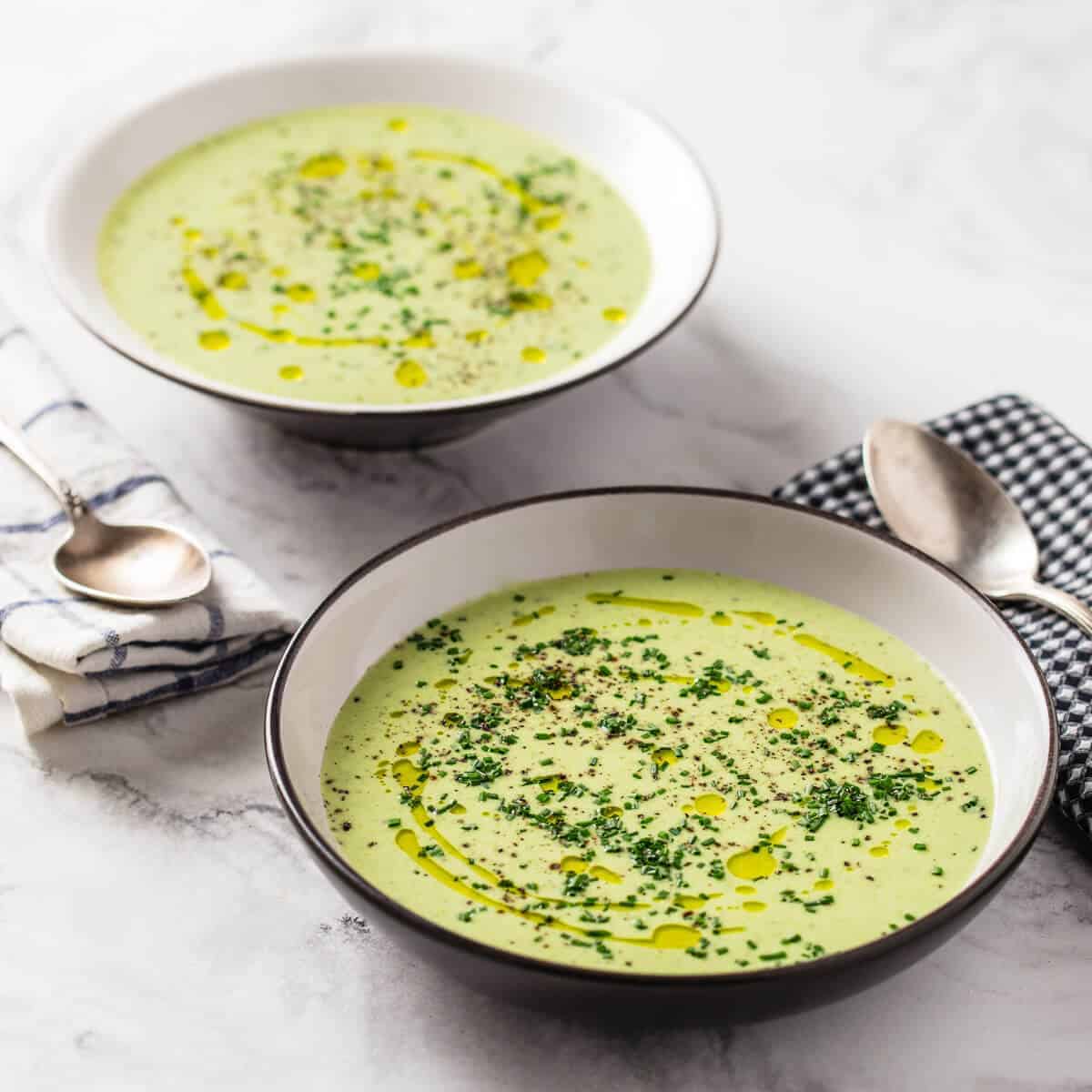 two bowls of potato leek soup