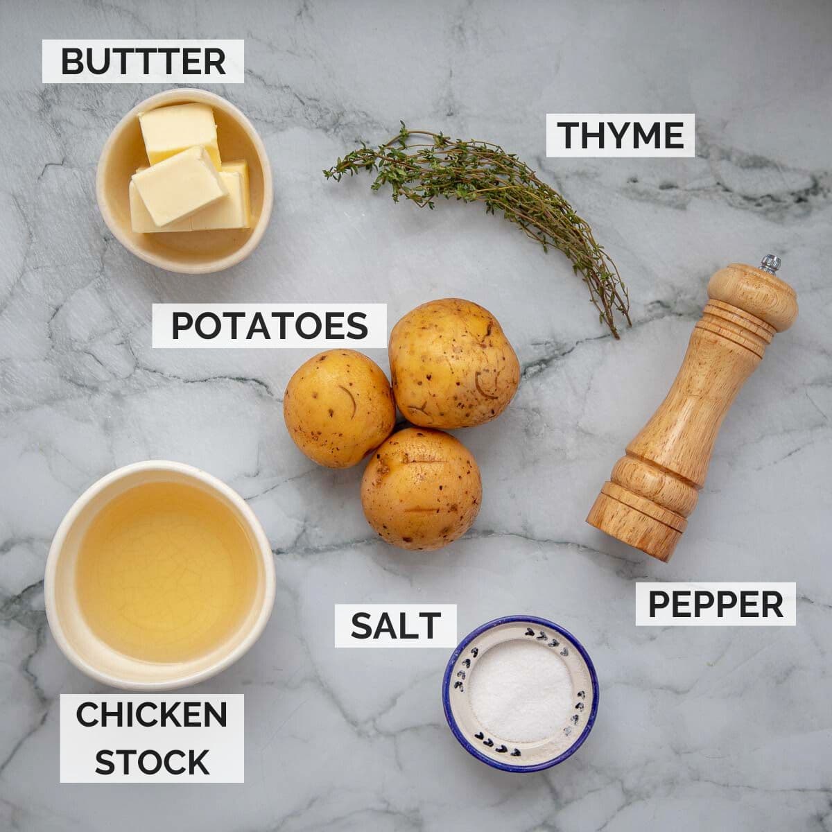 Ingredients for making potato fondant on a marble surface.