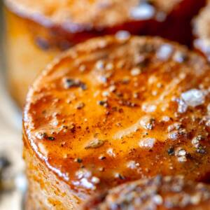 Close up of cooked potato fondants in stainless steel pan.