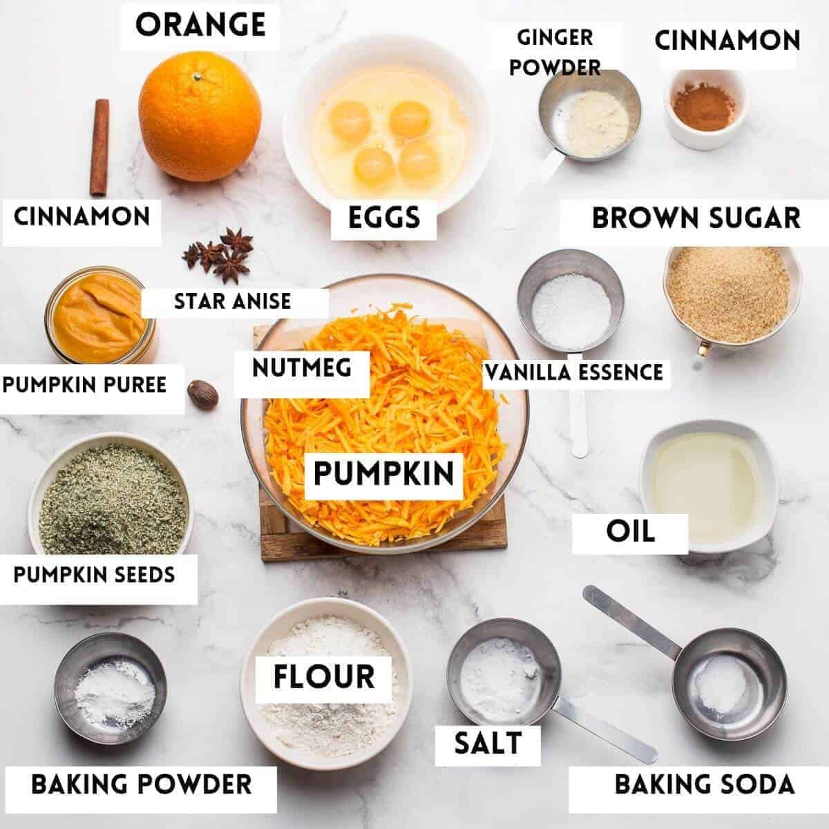 Ingredients needed to cook the cake on a marble board.