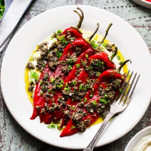 roasted peppers on white plate.