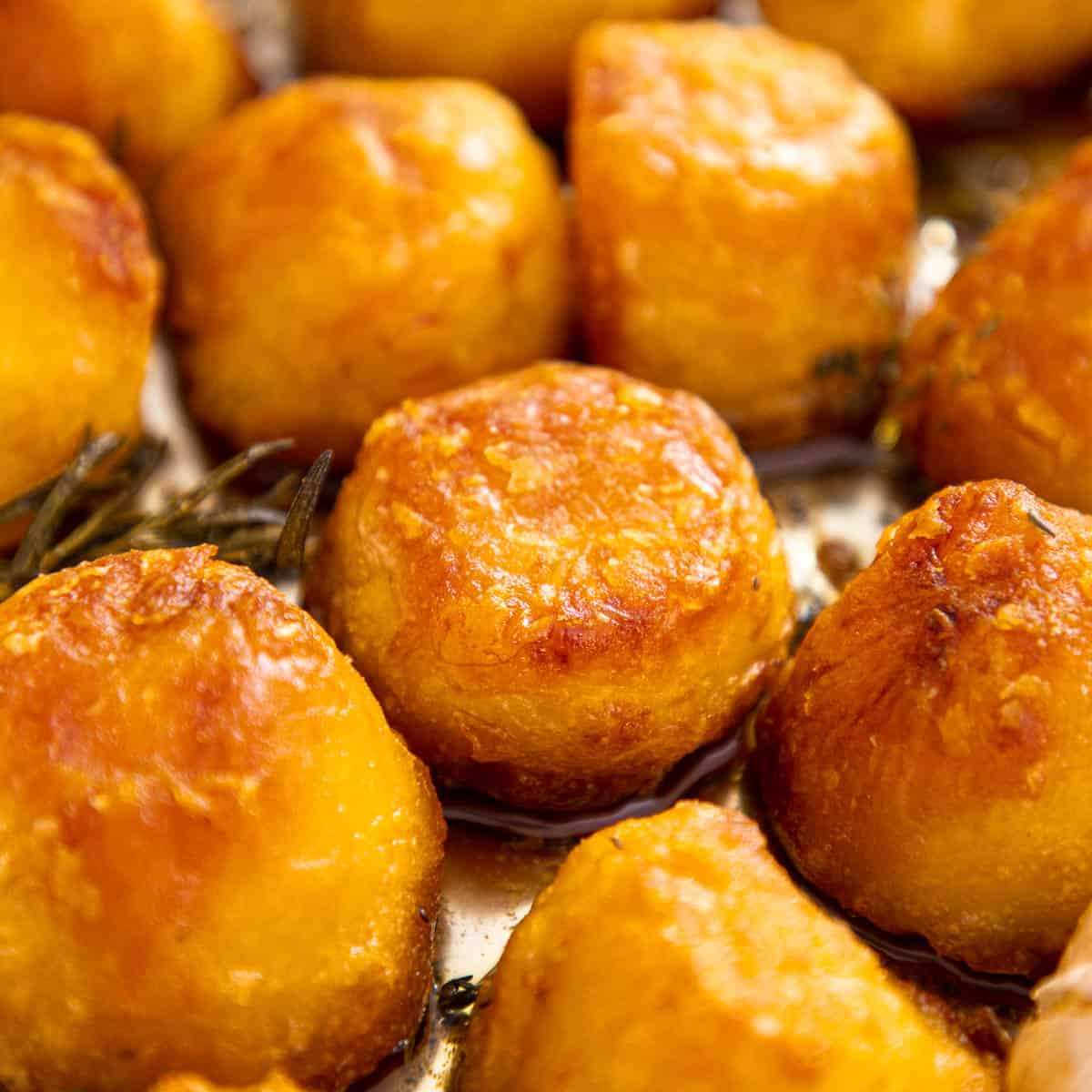 Roasted potatoes on a baking sheet.