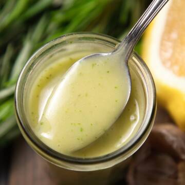 Rosemary vinaigrette in a glass jar.