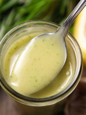 Rosemary vinaigrette in a glass jar.