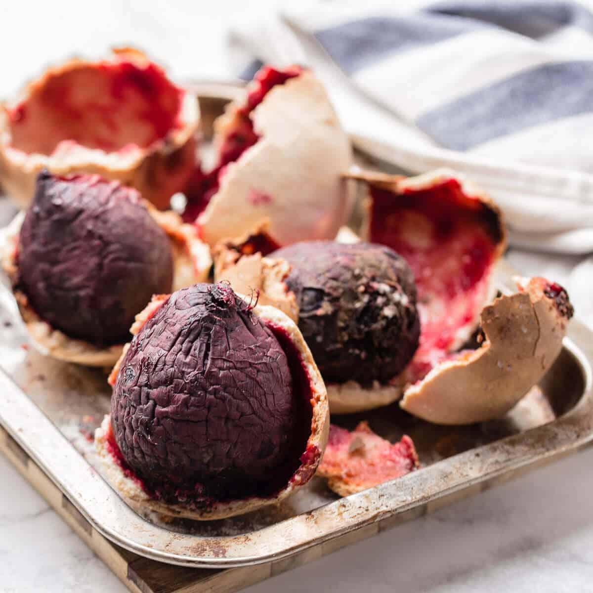 beetroot in a salt crust on a silver oven sheet