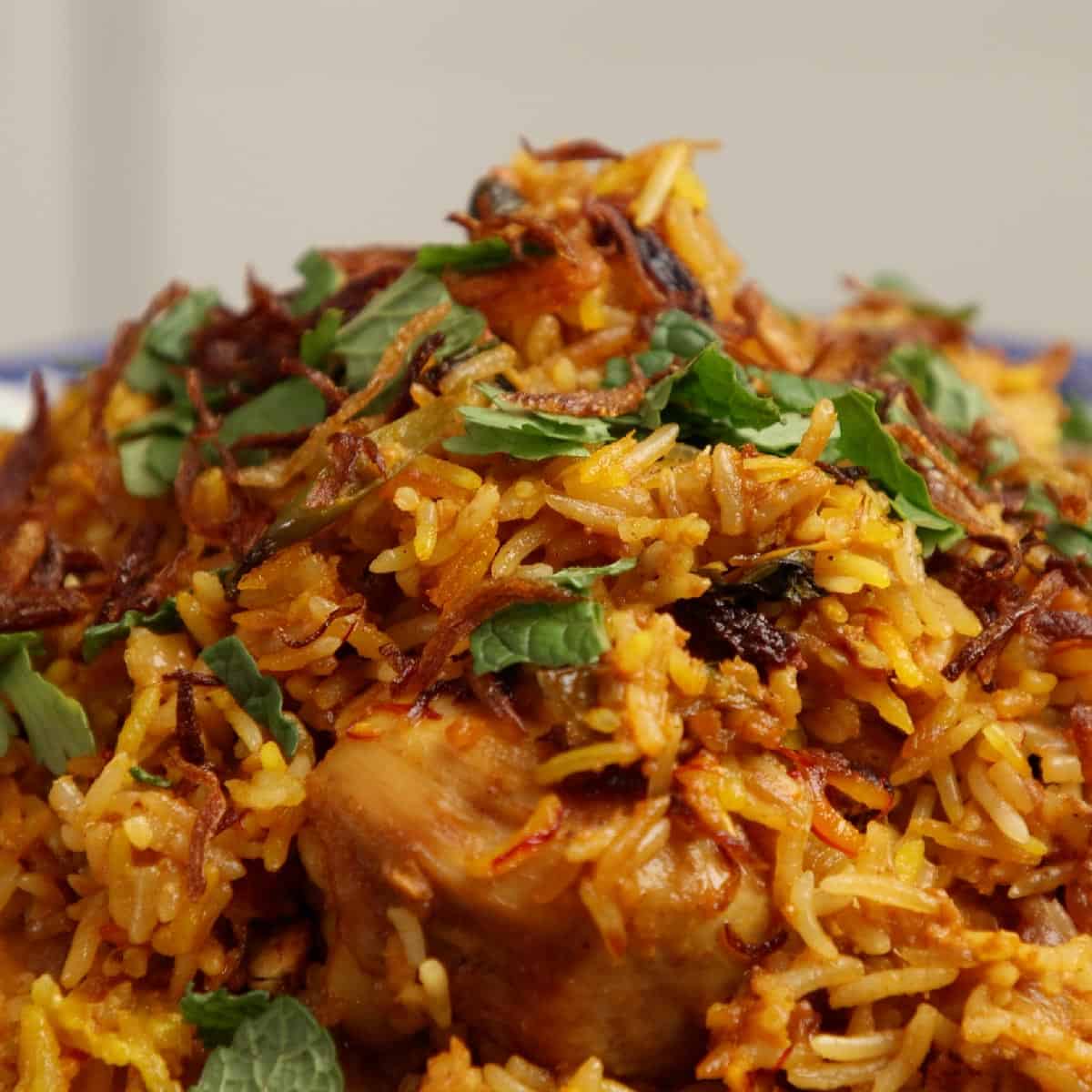 Biryani served in bowl.