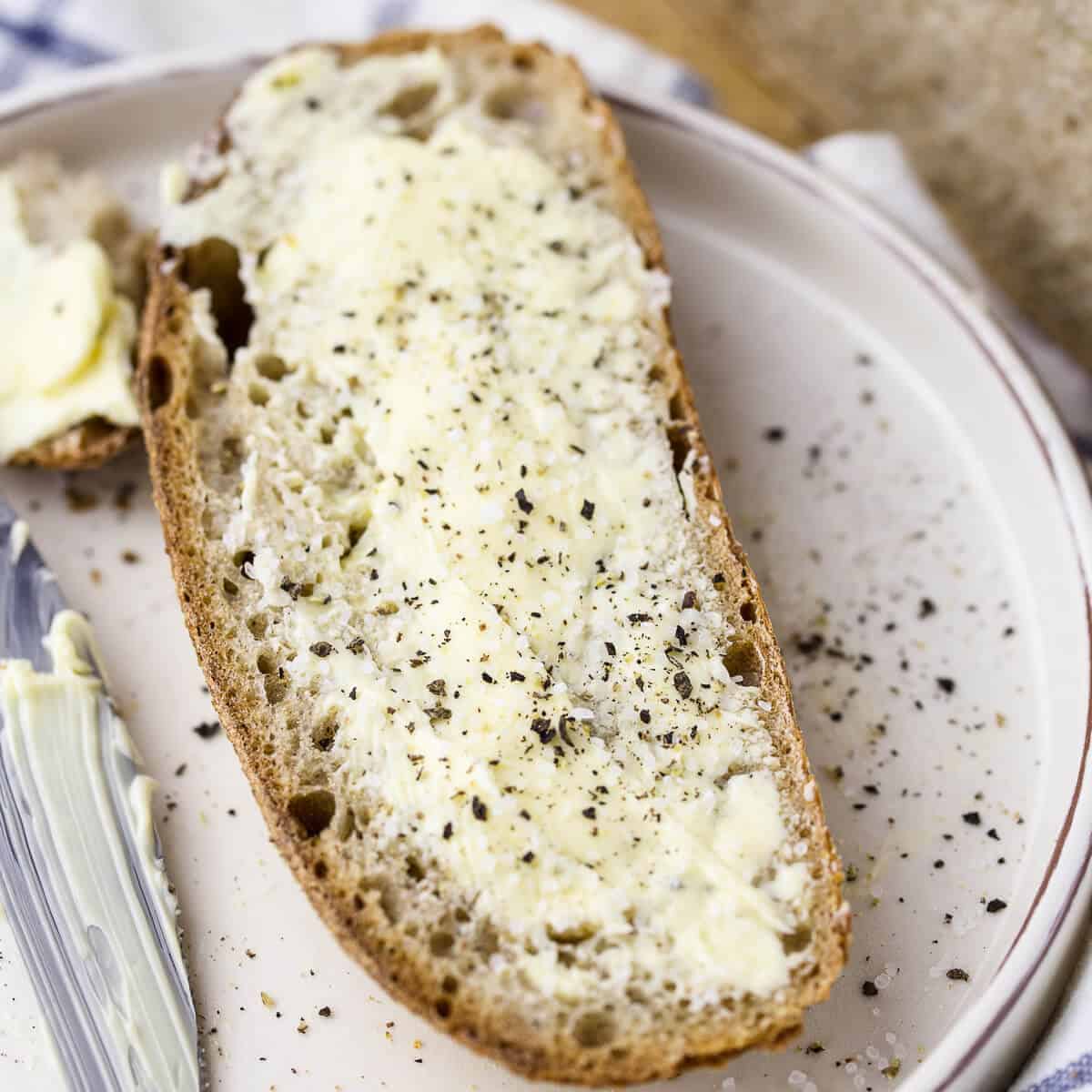 sourdough bread on a plate with butter