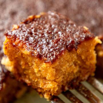 Malva pudding on cake lifter.